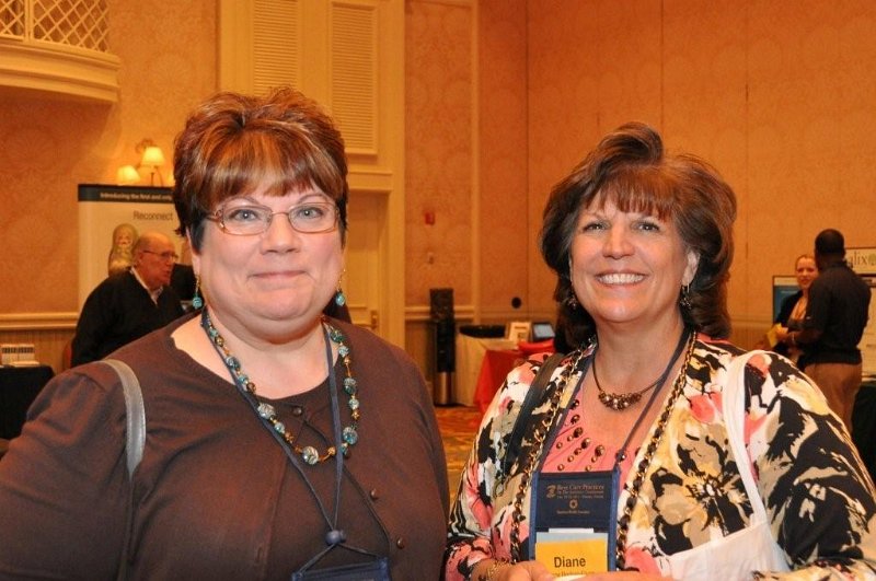 FMDA- Oct. 2011 039.jpg - Evercare’s Heidi Wold (left) and Diane Bednar-Flynn smile for a picture.